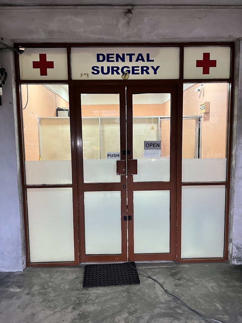 Entrance with Dental Surgery signage above glass doors